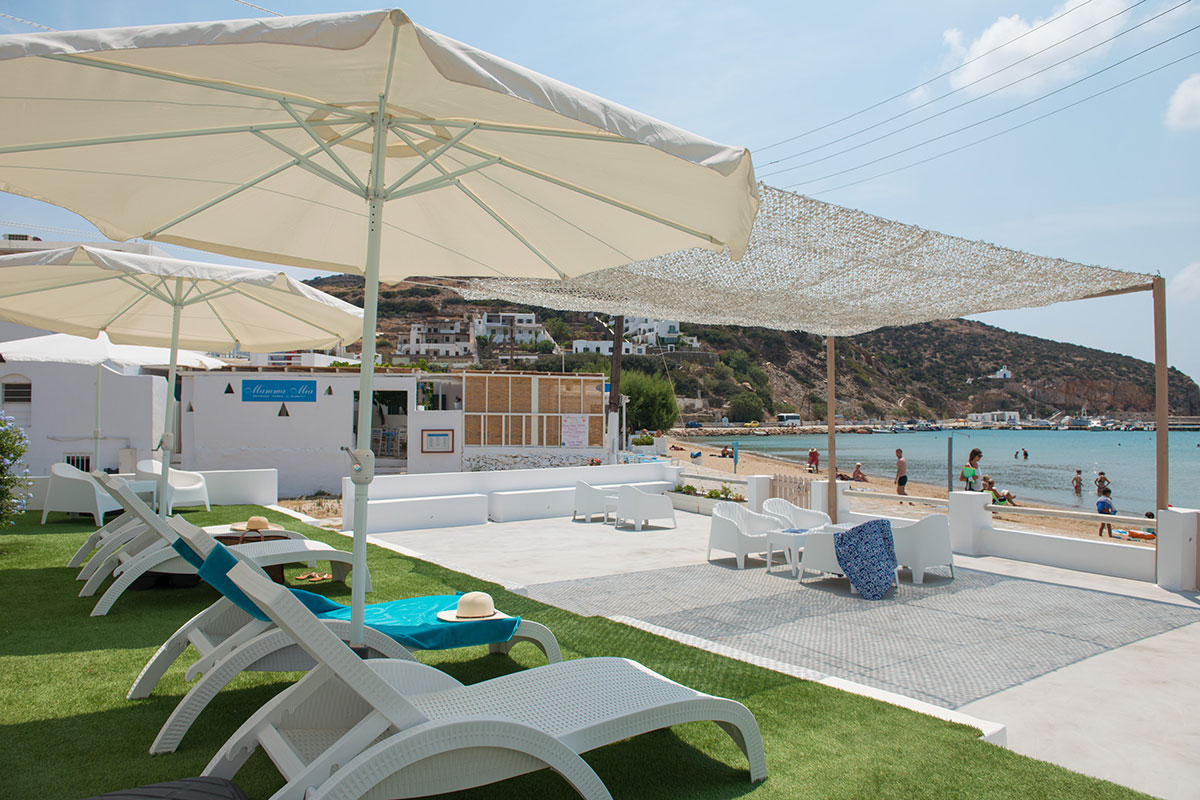 Shared courtyard with sun loungers by the sea
